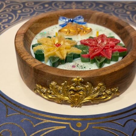 Golden bells & poinsettias in wooden bowl